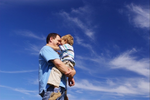 father-hugging-son